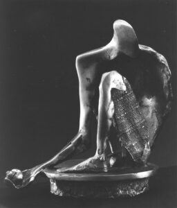 Figura csigamotívummal